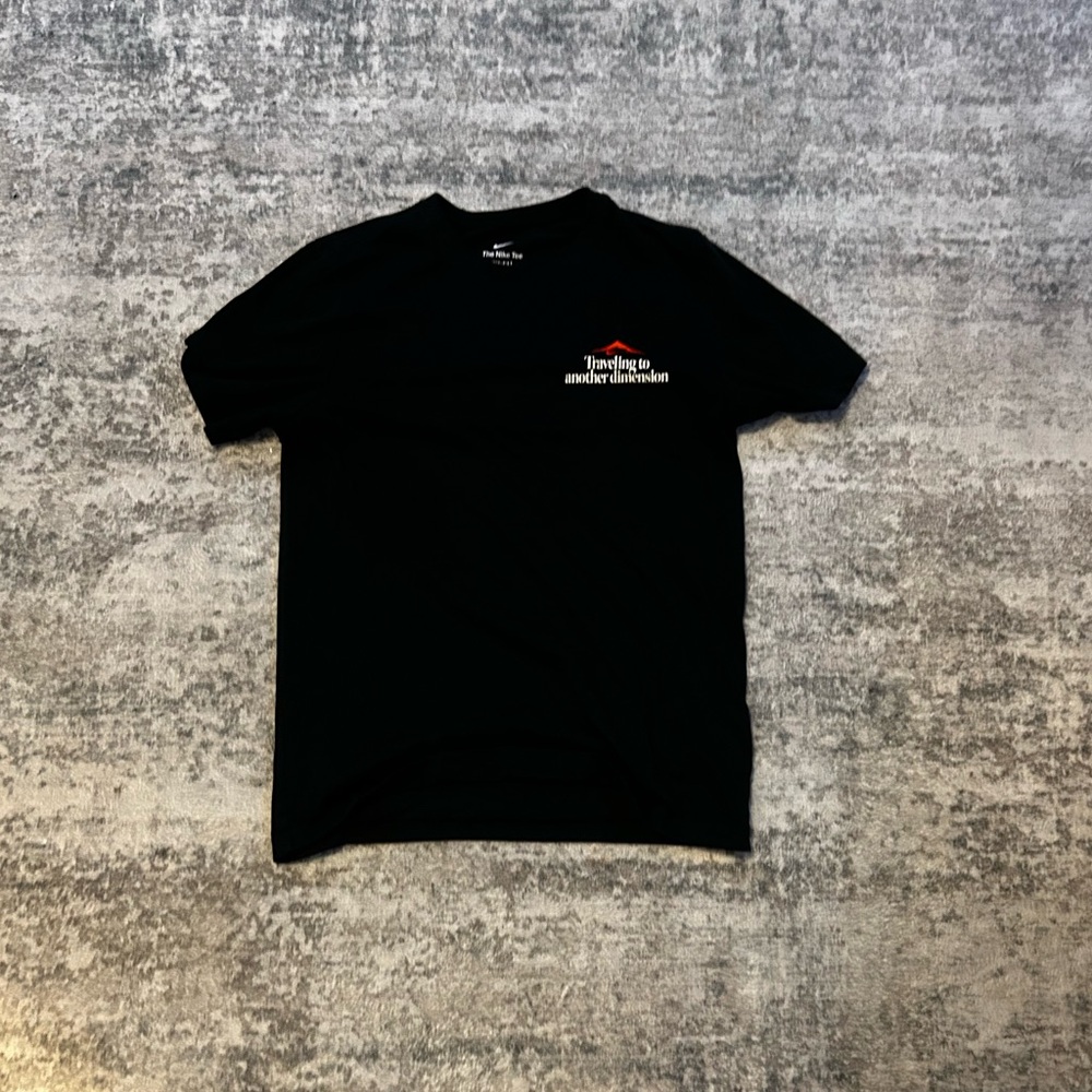 Medium black Nike T-Shirt with design on the back